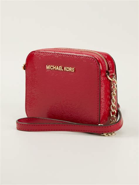 michael kors red jet set crossbody|Michael Kors studded crossbody bag.